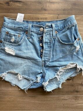 Women’s Levi 501 Button Fly Light Wash Distressed Denim Shorts - Blue W24